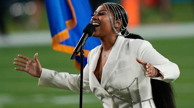 Jazmine Sullivan performs during the national anthem before the NFL Super Bowl 55 football game between the Kansas City Chiefs and Tampa Bay Buccaneers, Sunday, Feb. 7, 2021, in Tampa, Fla.