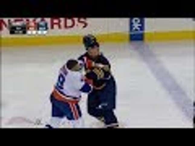 Justin Johnson Fights The Much Larger John Scott, And Wins