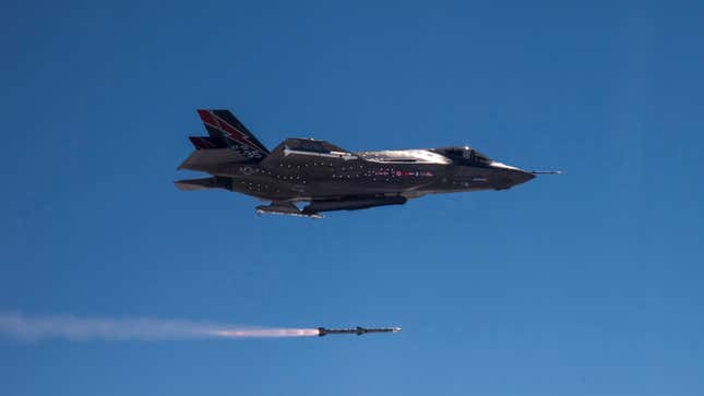 An early F-35A model undergoing testing in 2013, featuring the original major program partners’ flags on its side.