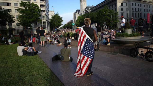 People attending a protest over the police killing of George Floyd on June 3, 2020 in Washington, DC