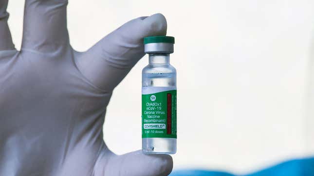  A health worker in Malaysia holds up a vial of Covishield, the version of AstraZeneca-Oxford’s Covid-19 coronavirus vaccine made in India