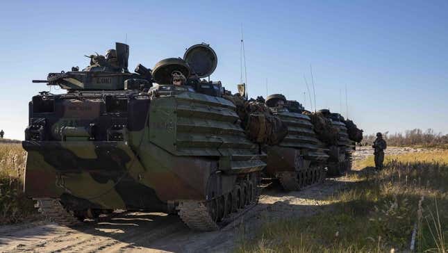 Marines with Battalion Landing Team 2nd Battalion, 8th Marine Regiment, 26th Marine Expeditionary Unit prepare for a beach raid exercise in a amphibious assault vehicle, Nov. 3, 2019.