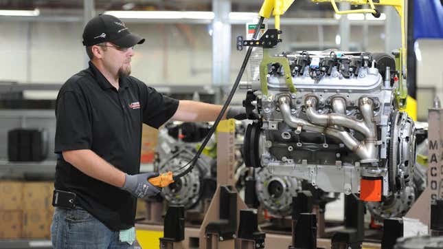 An Engine Builder weighing a completed Camaro Z/28 LS7 engine in the Performance Build Center Wednesday, October 22, 2014 at the plant in Bowling Green, Kentucky.