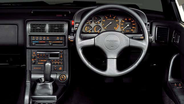 This is a Japanese RX-7, similar to what mine looked like. You can see the door pull to the right.