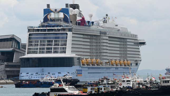 The Royal Caribbean cruise ship “Quantum of the Seas” is seen docked at Marina Bay Cruise Center in Singapore on December 9, 2020.