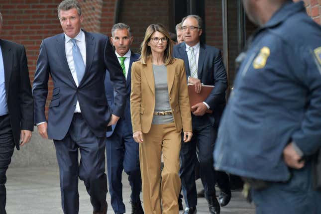 Lori Loughlin exits the John Joseph Moakley U.S. Courthouse after appearing in federal court to answer charges stemming from college admissions scandal on April 3, 2019 in Boston.