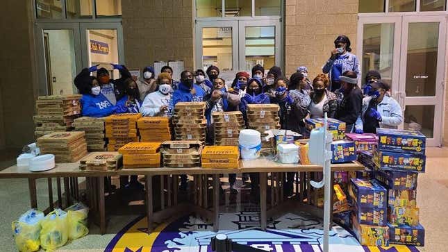 Volunteers in Jackson, Miss., preparing to distribute food and water to residents.