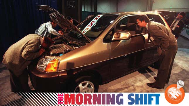 A Honda fuel cell car for California, photographed being inspected by journalists in 1996. Progress is slow in the car world.