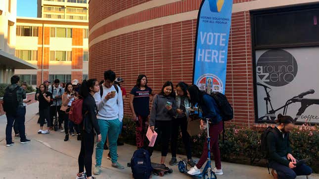 Voters line up outside a polling place at the University of Southern California in Los Angeles on March 3, 2020.