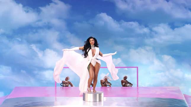 Image for article titled Cardi B Using a White Man As a Table, and Other Important Moments from the 'Up' Video