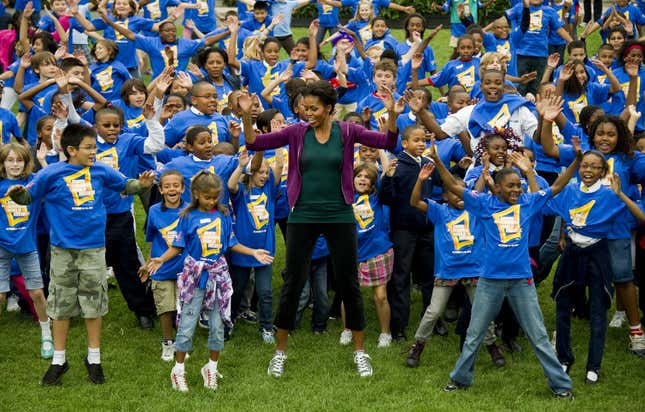 First Lady Michelle Obama launches a challenge on the White House South Lawn to help break the Guinness World Records title for the most people doing jumping jacks in a 24-hour period during a “Let’s Move!” event in Washington, D.C., Oct. 11, 2011.