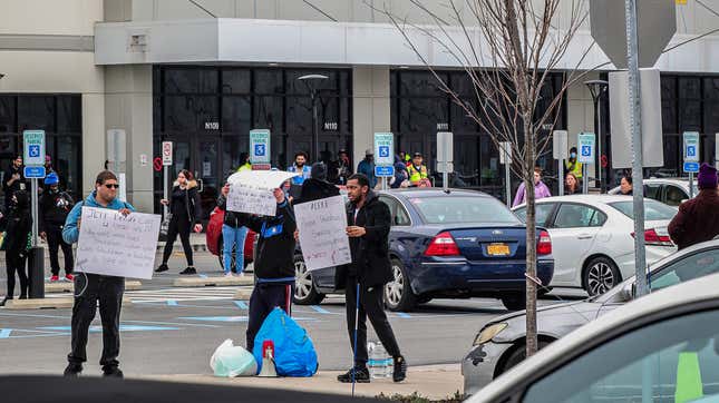 In this March 30, 2020, file photo, workers at Amazon’s fulfillment center in the Staten Island borough of New York protest work conditions in the company’s warehouse.