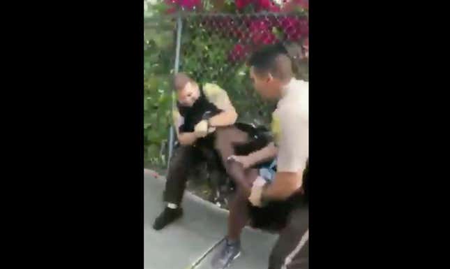 Image for article titled Miami Cop Filmed Brutally Arresting Dyma Loving Arrested, Charged With Battery