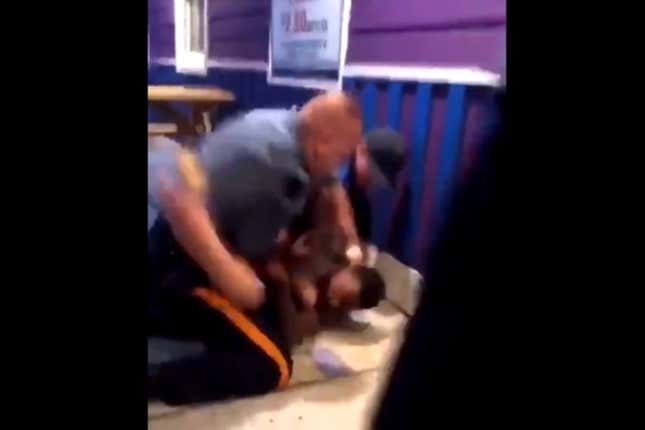 Image for article titled Video Prompts Investigation Into New Jersey Police Officer Seen Repeatedly Punching Restrained Black Man