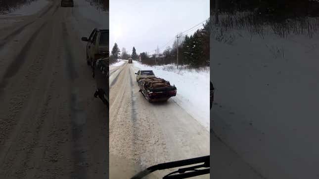 Here's How You Tow A Wheel-less Car In Snowy Russia