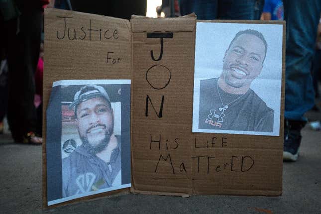 People gather for a march, rally and candle light vigil in honor Jonathan Price on October 5, 2020 in Wolfe City, Texas. Wolfe City police officer Shaun Lucas has been charged in relation to the fatal shooting of Price on October 3, 2020 after Price was allegedly trying to stop a domestic dispute. 