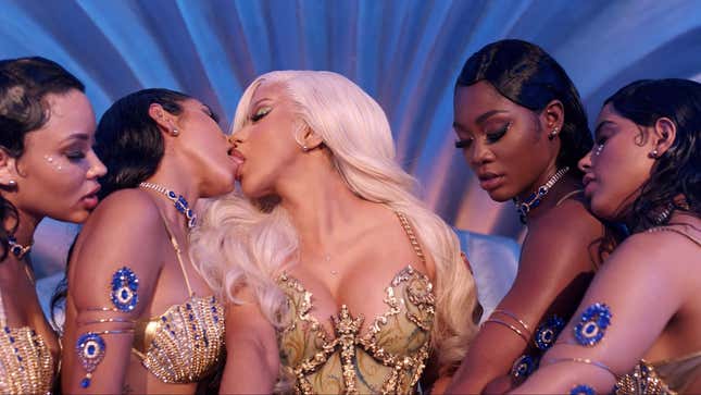 Image for article titled Cardi B Using a White Man As a Table, and Other Important Moments from the 'Up' Video