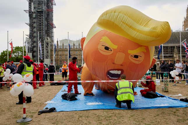 Trump Babysitters inflate a large Trump Baby Blimp in Parliament Square outside Westminster on June 4, 2019 in London, England.