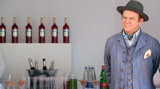 John C. Reilly, pictured here with Campari’s famous bitters, probably keeps excellent backups.