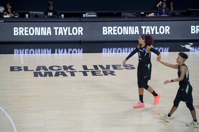 New York Liberty players Amanda Zahui B and Layshia Clarendon.
