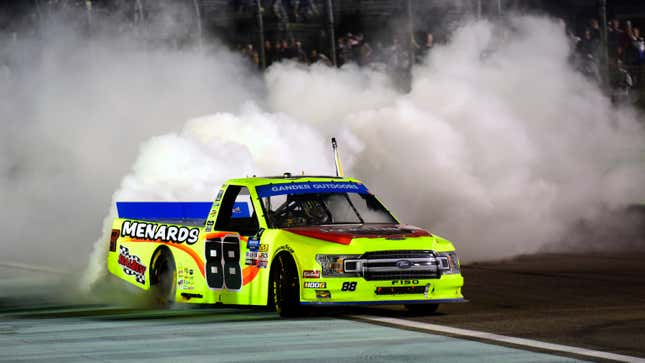 Matt Crafton does a celebratory burnout after winning the NASCAR Truck Series championship at Homestead-Miami Speedway.