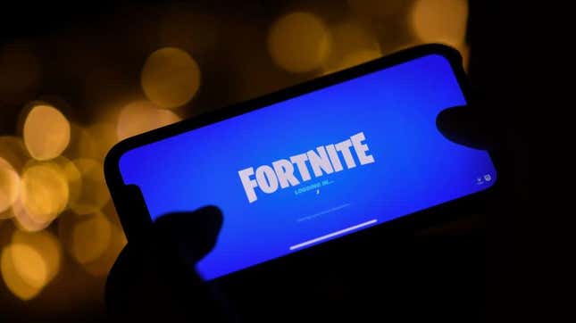 a person logging into Epic Games' Fortnite on their smartphone in Los Angeles on August 14, 2020