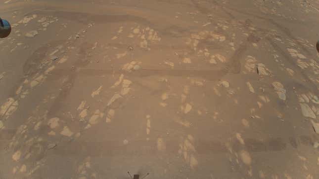 This is the first color image of the Martian surface taken by an aerial vehicle while it was aloft. The Ingenuity Mars Helicopter captured it with its color camera during its second successful flight test on April 22, 2021.