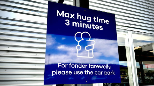 Airport Imposes Hug Time Limit, Suggests Moving PDA To Parking Lot