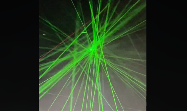 Dozens of lasers got pointed at a passenger jet pilot as it flew over
a festival