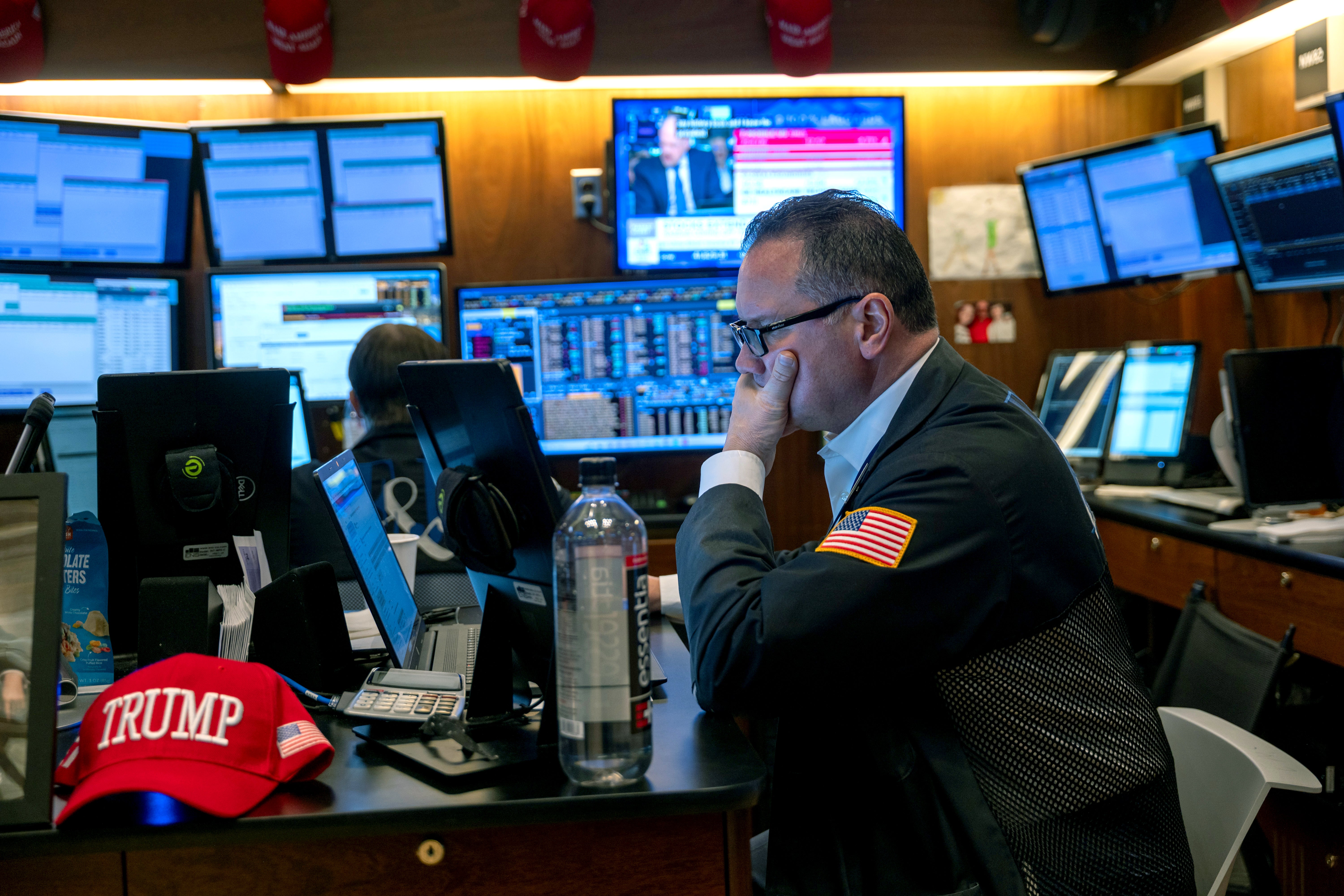 Image for The Dow bounces back 675 points a day after the S&P 500 fell into a correction